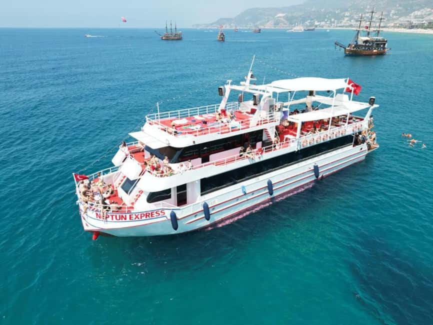 From Alanya: Boat Tour with Unlimited Soft Drinks and Lunch - The Boat Experience: Sunbeds, Shower, Toilets, and an Air-Conditioned Ride