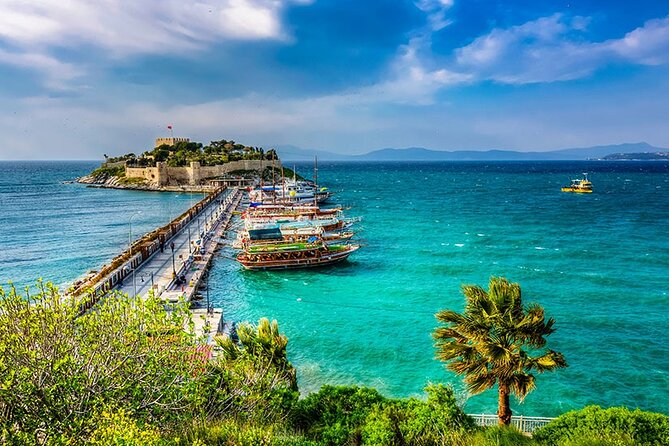 Kusadasi & National Park Boat Tours with Lunch and Transfer - Onboard fun: music, photos, and a foam party moment