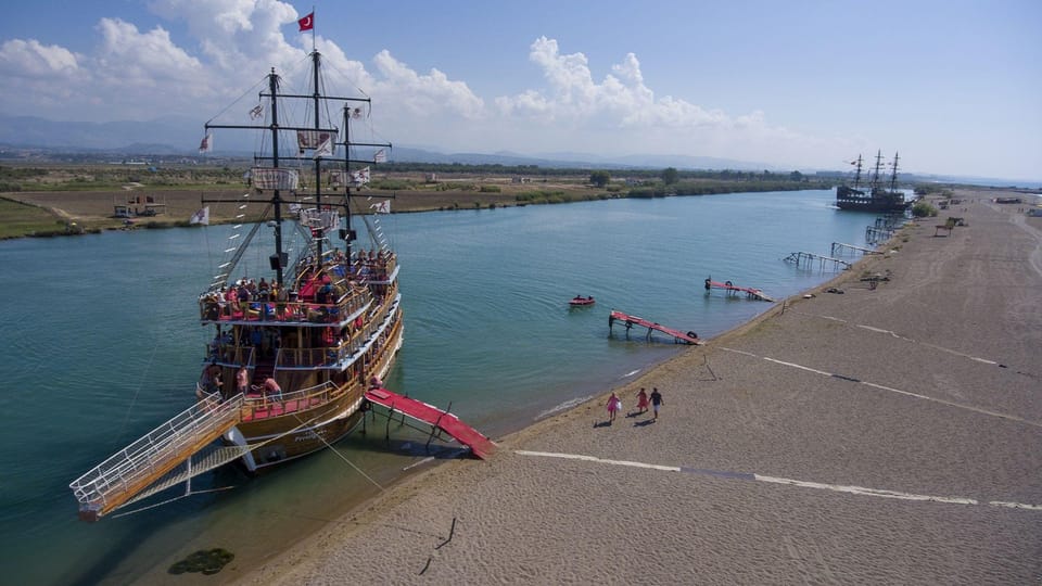 Side: Dolphin Island Boat Trip with Lunch & Unlimited Drinks - Foam Party, Pirate Entertainment, and Family Energy