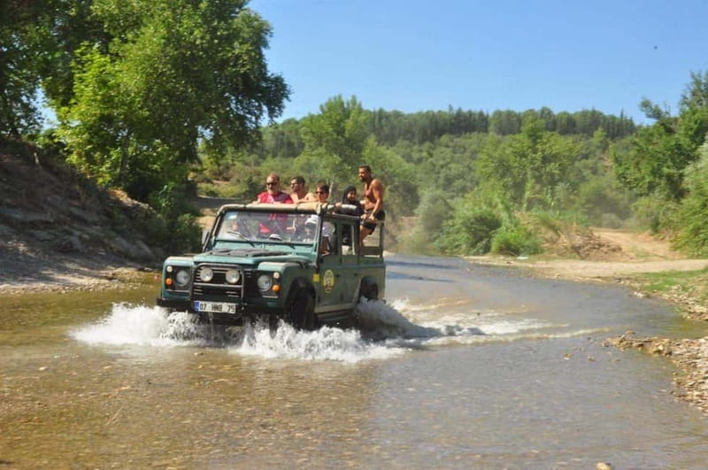 Side: Jeep Safari Adventure with Lunch at Green Lake - The Jeep Ride Itself: Bumpy, Dusty, Wet (In That Order)